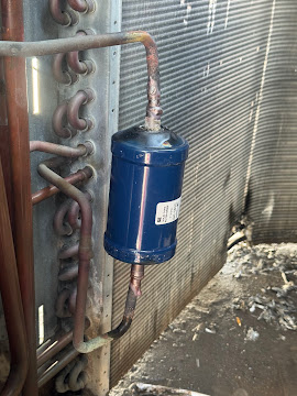 New liquid line filter drier brazed into a condenser unit